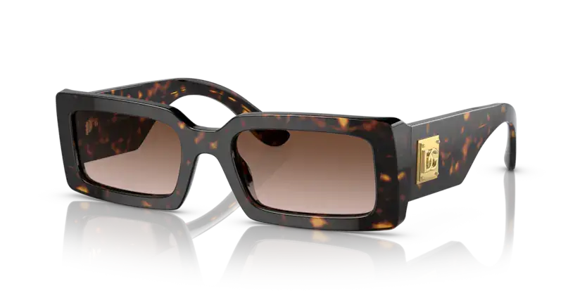 Dolce & Gabbana 0DG4416 sunglasses in tortoiseshell frame with gradient lenses, stylish oversized design.