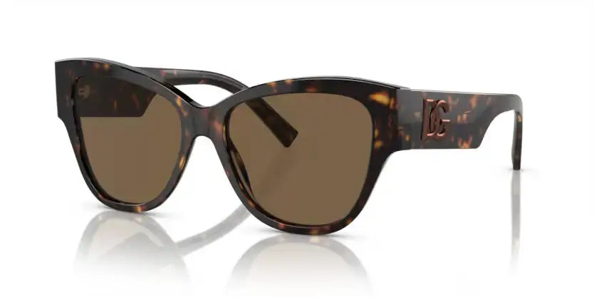 Dolce & Gabbana 0DG4449 sunglasses in tortoiseshell frame with brown lenses, stylish and elegant accessory.