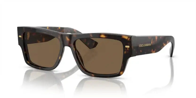 Dolce & Gabbana 0DG4451 sunglasses in tortoiseshell with brown lenses, stylish and trendy eyewear for a chic look.