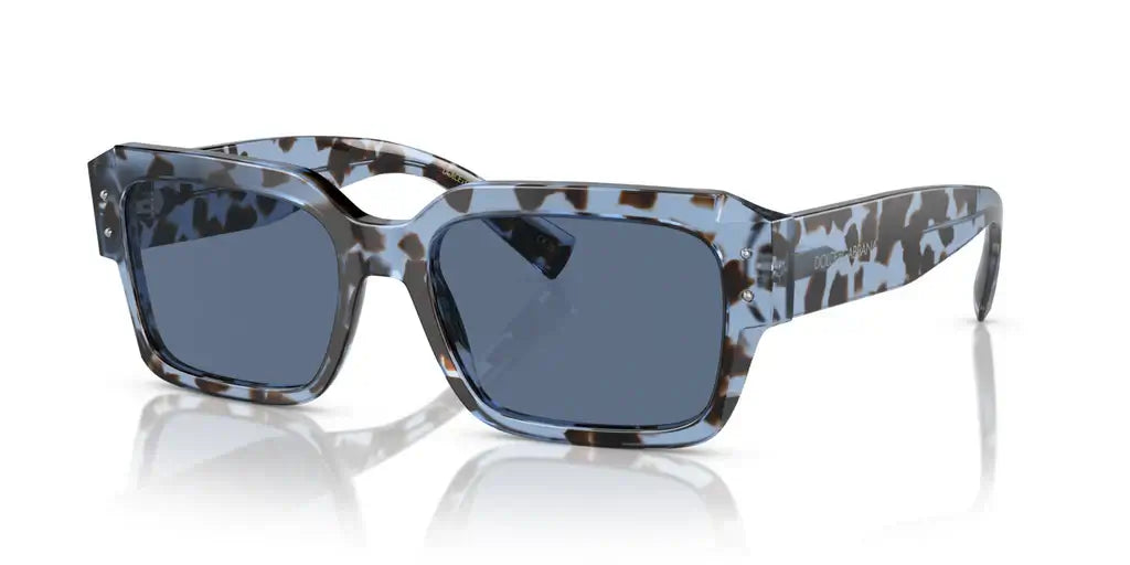 Dolce & Gabbana 0DG4460 sunglasses in blue tortoise shell design, featuring oversized square frames and dark lenses.