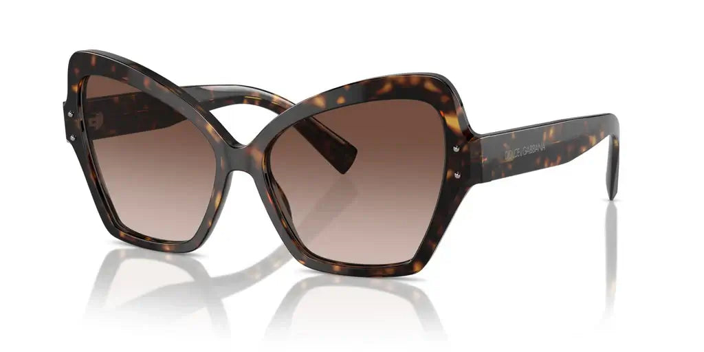 Dolce & Gabbana 0DG4463 oversized tortoiseshell sunglasses with gradient lenses, stylish fashion accessory for summer.