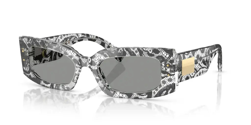 Dolce & Gabbana 0DG4479 sunglasses featuring a stylish snake print design with gray lenses and a bold silhouette.