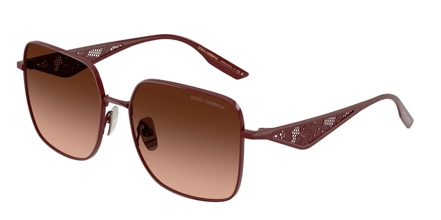 Dolce & Gabbana 0DG2310 sunglasses in burgundy with gradient lenses and decorative side detailing. Stylish eyewear for fashion enthusiasts.