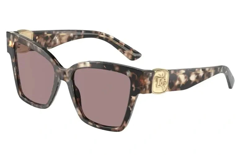 Stylish Dolce & Gabbana 0DG4470 sunglasses in trendy tortoiseshell design with gold logo accents.