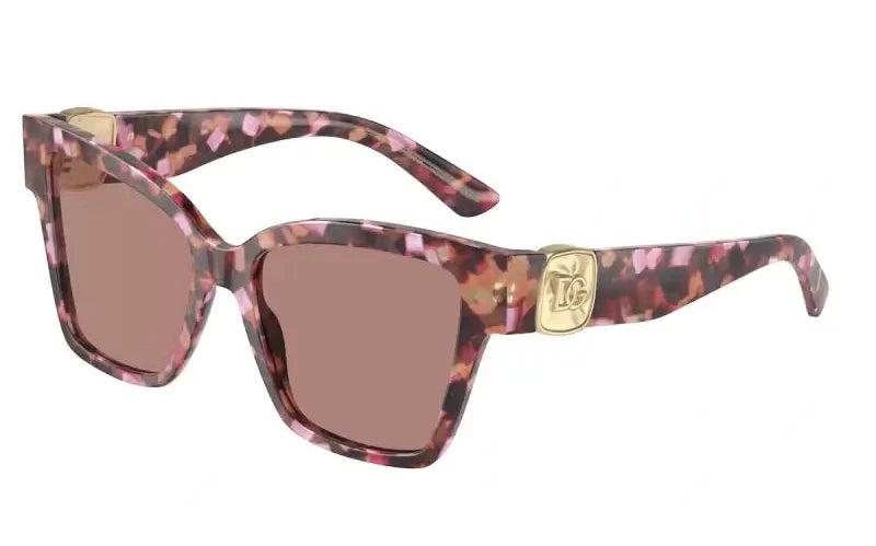 Dolce & Gabbana 0DG4470 sunglasses with a chic pink and brown patterned frame, featuring logo detail on the side.