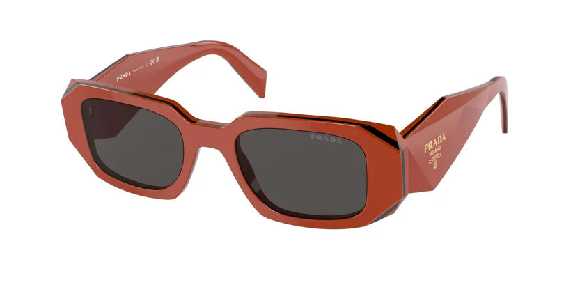 PRADA 0PR 17WS sunglasses in bold red frame with dark lenses, showcasing modern and stylish eyewear design.